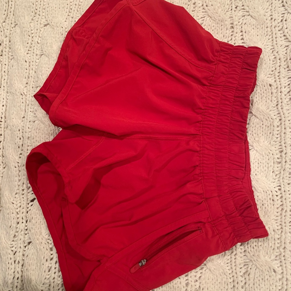 Red women’s lululemon tracker shorts